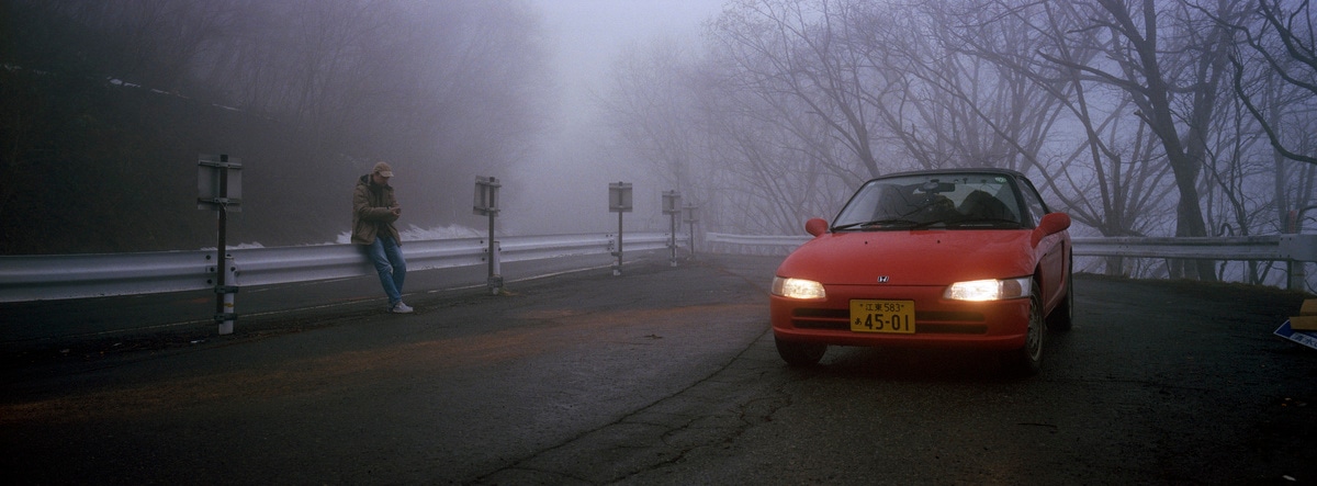 Honda Beat in the fog, on our way to Omachi, Japan. Taken by Lucas Taylor on a Hasselblad XPan camera.