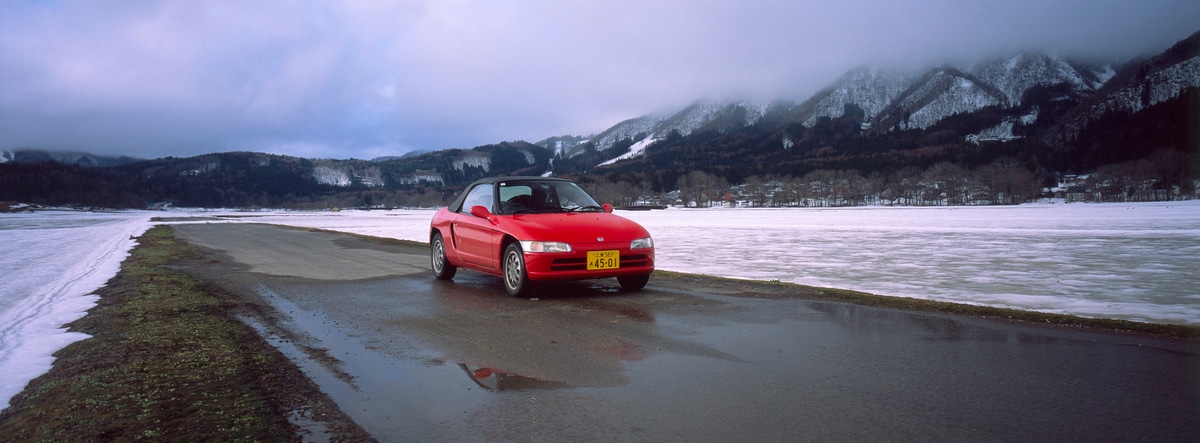 Honda Beat in a snowy landscape. Taken by Lucas Taylor on a Hasselblad XPan camera.
