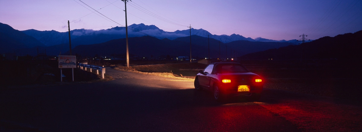 Honda Beat enjoying the sunset in Omachi, Japan. Taken by Lucas Taylor on a Hasselblad XPan camera.