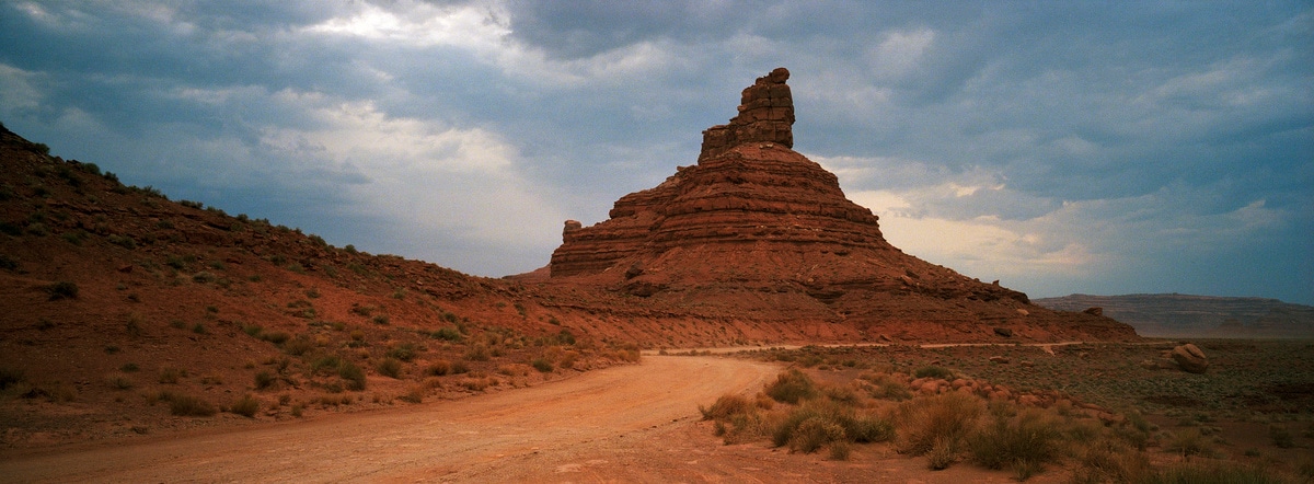 Dramatic rock formation in Valley of the Gods, Utah, USA. Taken by Lucas Taylor on a Hasselblad XPan camera.
