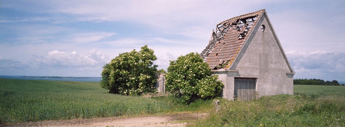 Abandoned building with collapsed roof. Taken by Lucas Taylor on a Hasselblad XPan camera.