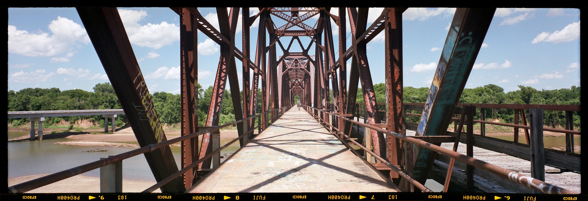 6x17 photograph taken on an old rusted bridge on the border between Oklahoma and Texas, USA. Taken by Lucas Taylor on the ND 6x17 camera.