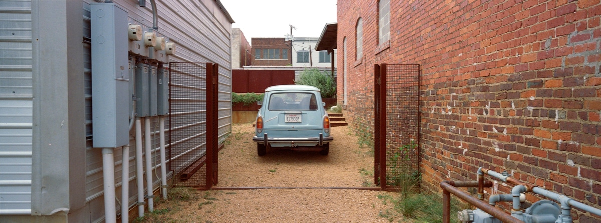 An old, but well-kept, Volkswagen in Paris, Texas. Taken by Lucas Taylor on a Hasselblad XPan camera.