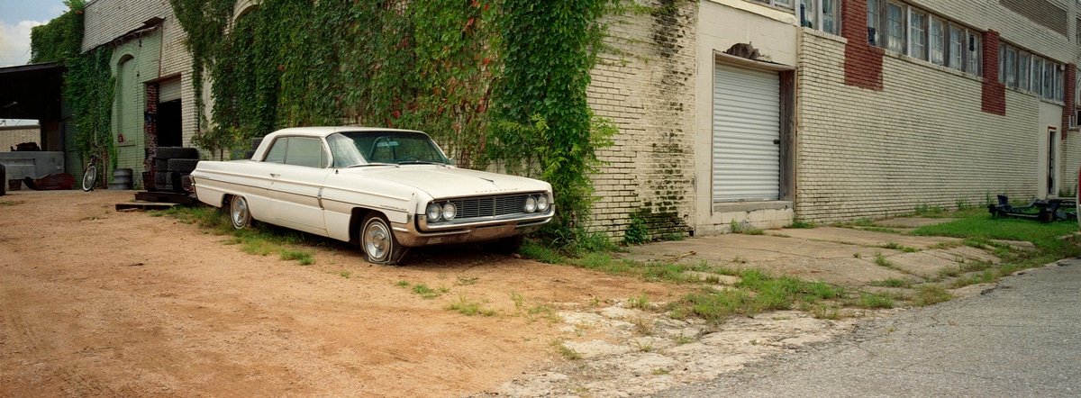 A random car workshop in Coalgate, Oklahoma. Taken by Lucas Taylor on a Hasselblad XPan camera.