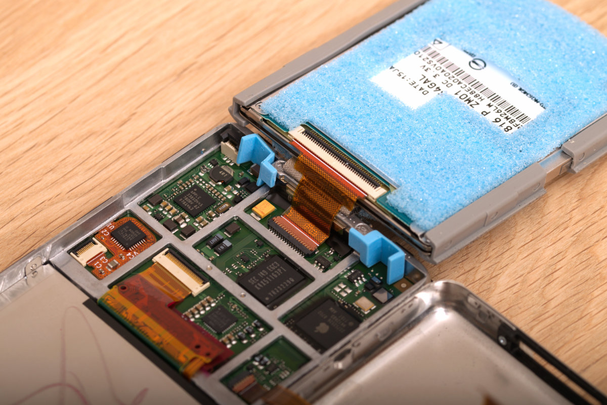 The iPod's internal HDD still connected to the logic board