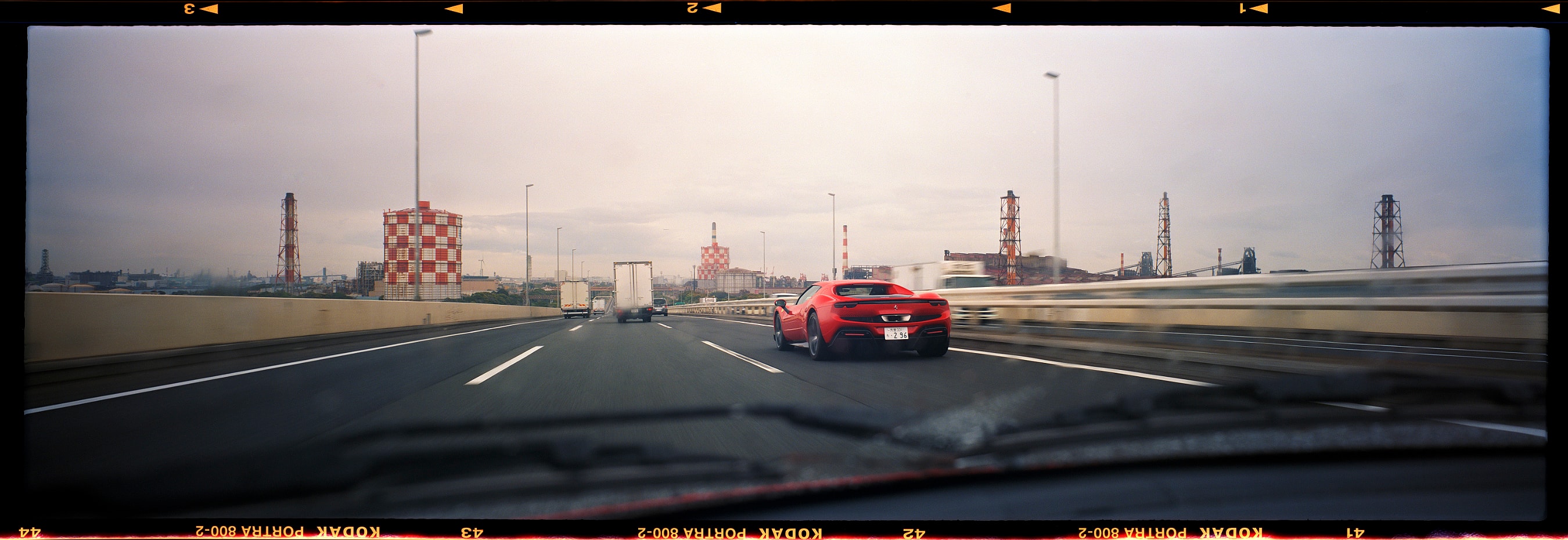 6x17 rolling shot of a Ferrari 296 GTB taken in Tokyo, Japan. Taken by Lucas Taylor on the ND 6x17 camera.